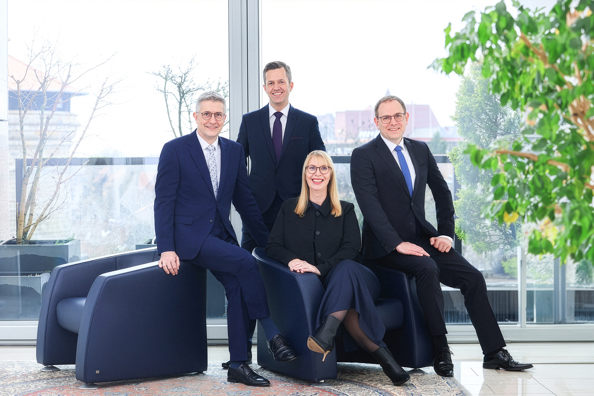 Gemeinschaftsbild der vier Vorstände der uniVersa Versicherungen